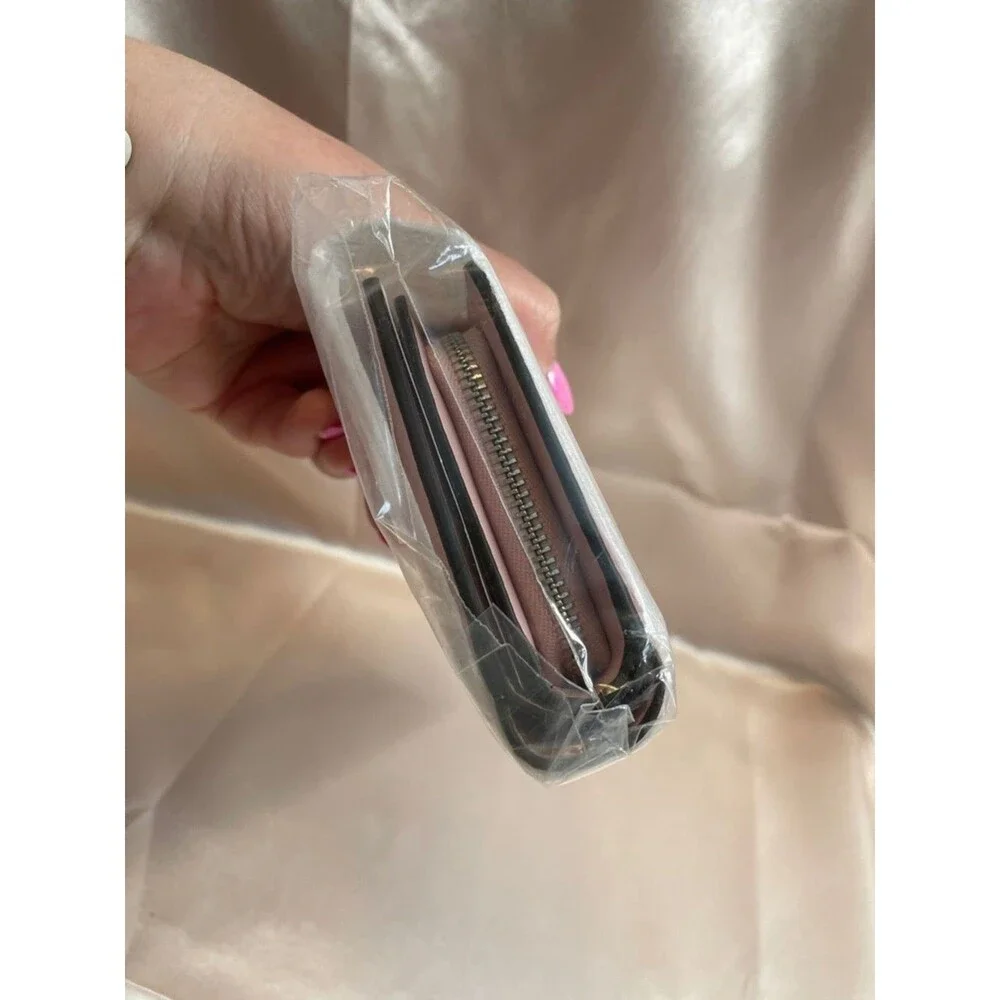 kate spade Pink Pebbled Leather Wallet